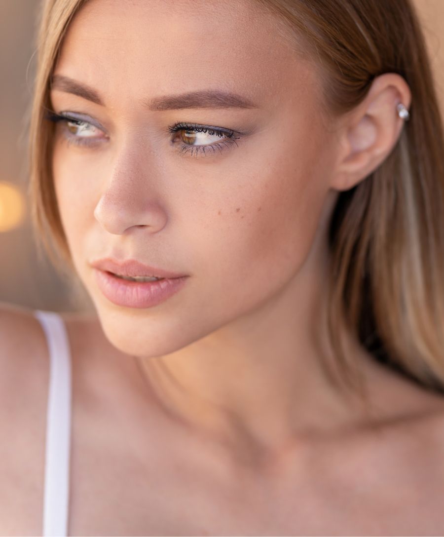 Branson lip filler model with blonde hair